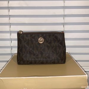 Small brown Michael Kors cosmetic bag